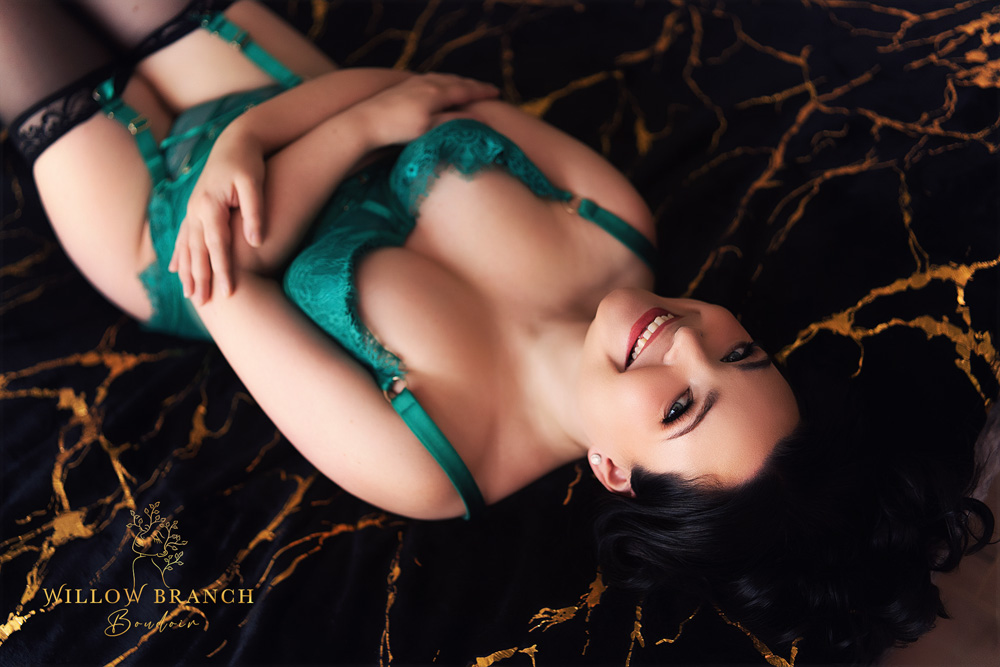 Gold Coast boudoir photo session featuring smiling woman in photo studio for a Boudoir Experience Upper Coomera.