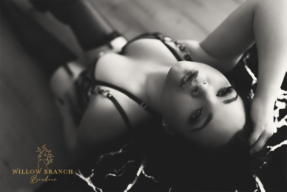 Gold Coast boudoir photo shoot capturing empowered feminine energy in black and white