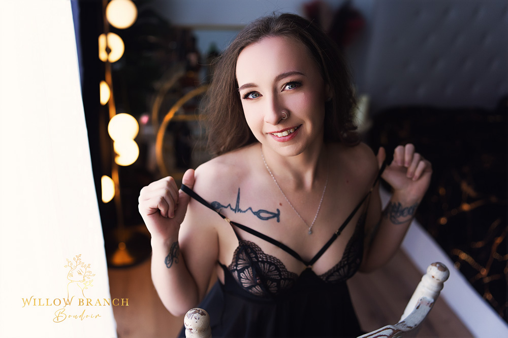 Upper Coomera boudoir photography close up portrait with natural tones of woman smiling in luxury studio