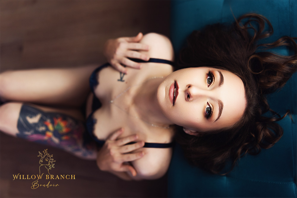 Upper Coomera boudoir photo shoot capturing feminine confidence and curves, woman looking at camera