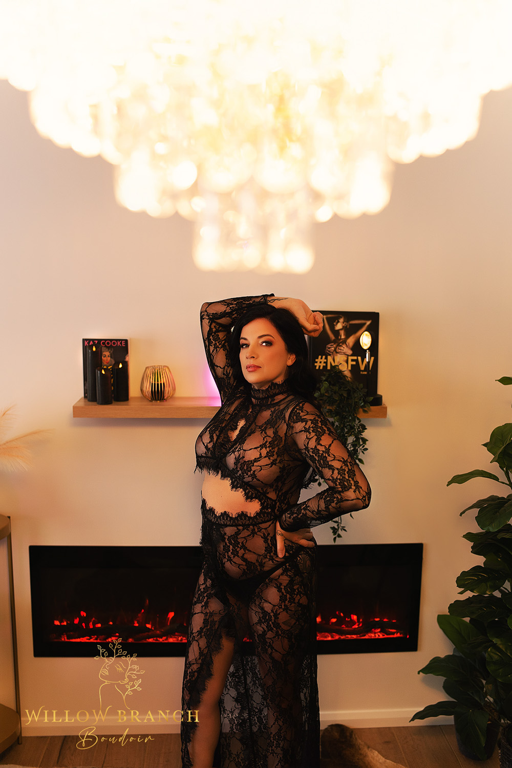 Woman standing in glamorous pose in front of fireplace during Healing Boudoir session on the Gold Coast